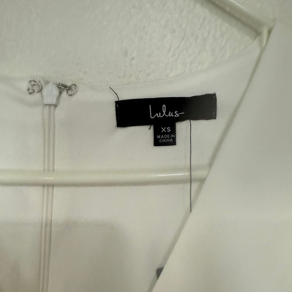 NWT Lulus Rooftop Bar White Long Sleeve Faux-Wrap Belted Skort Romper Size XS - Picture 6 of 7